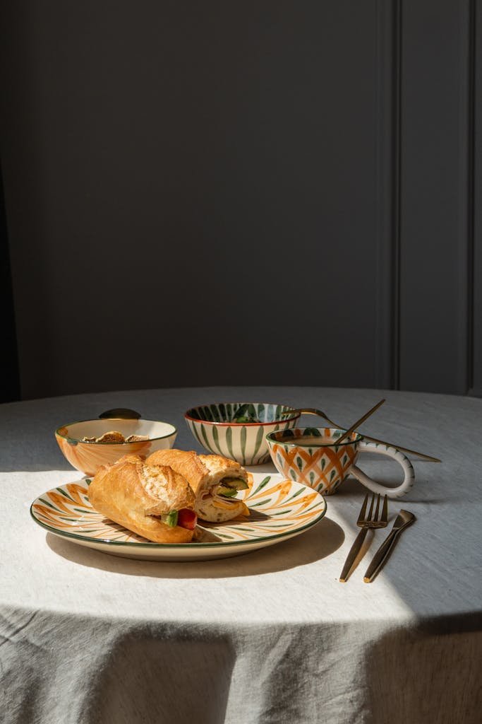 Still Life with Sandwiches and Porcelain on a Table