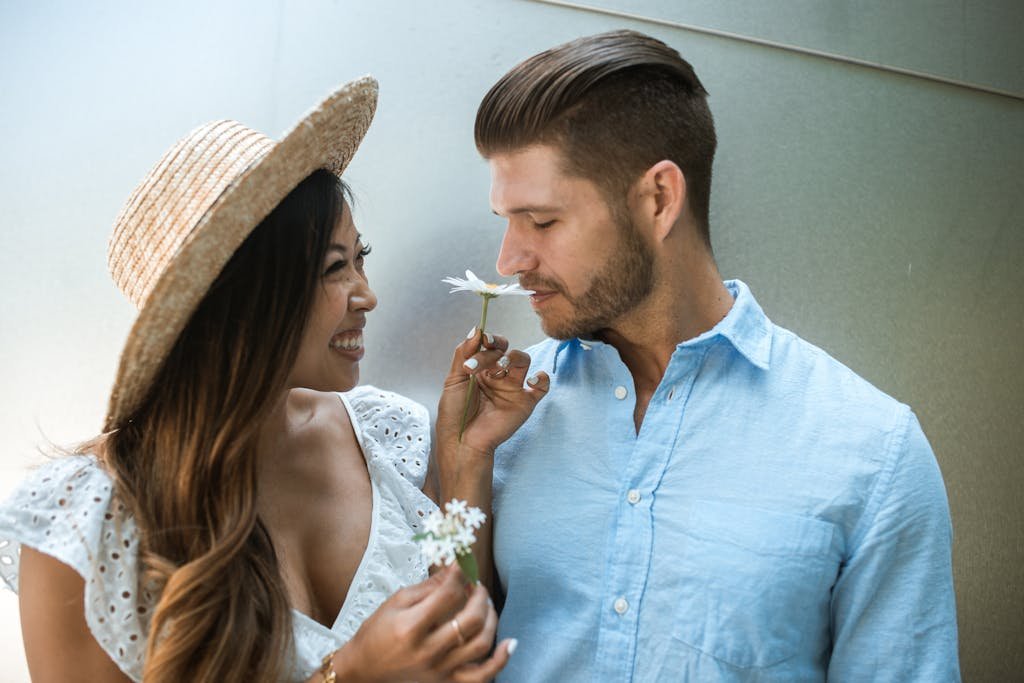 Woman Showing a Flower to a Man